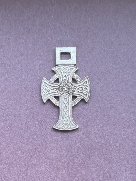 Silver Celtic ornated cross with intricate design