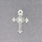 ornated silver cross pendant