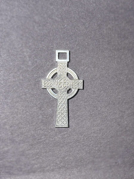 Silver ornated cross Celtic knot
