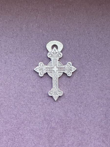 Silver ornated cross